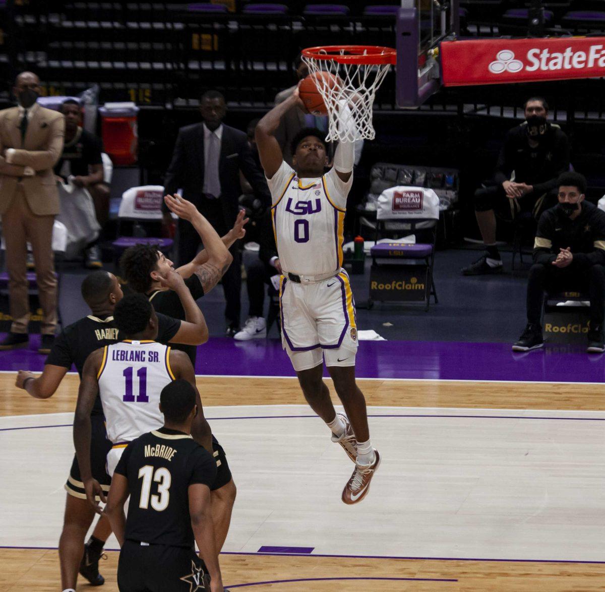 LSU men&#8217;s basketball freshman forward Mwani Wilkinson (0) dunks the ball Tuesday, March 2, 2021 during LSU&#8217;s 83-68 win against Vanderbilt in the Pete Maravich Assembly Center on N. Stadium Drive in Baton Rouge.