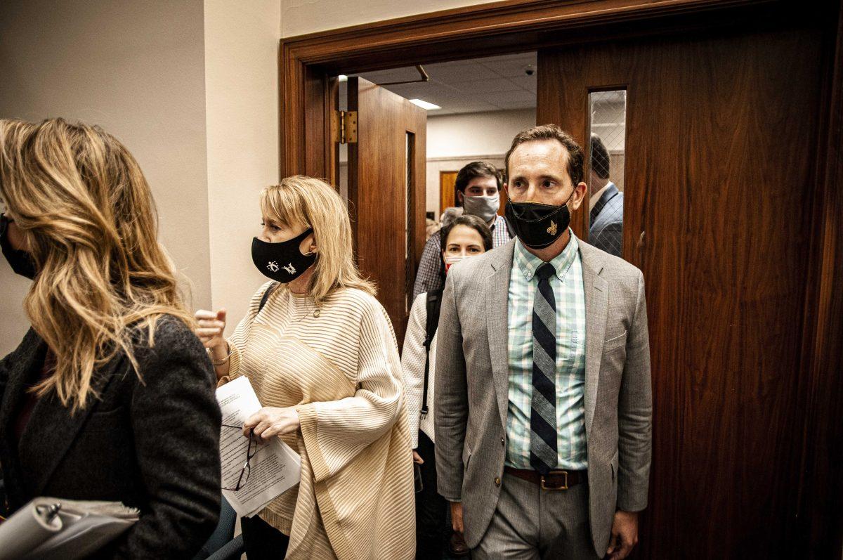 People enter the senate room shortly before the Title IX hearing on Wednesday, March 10, 2021 at the Louisiana State Capitol on North Third Street.