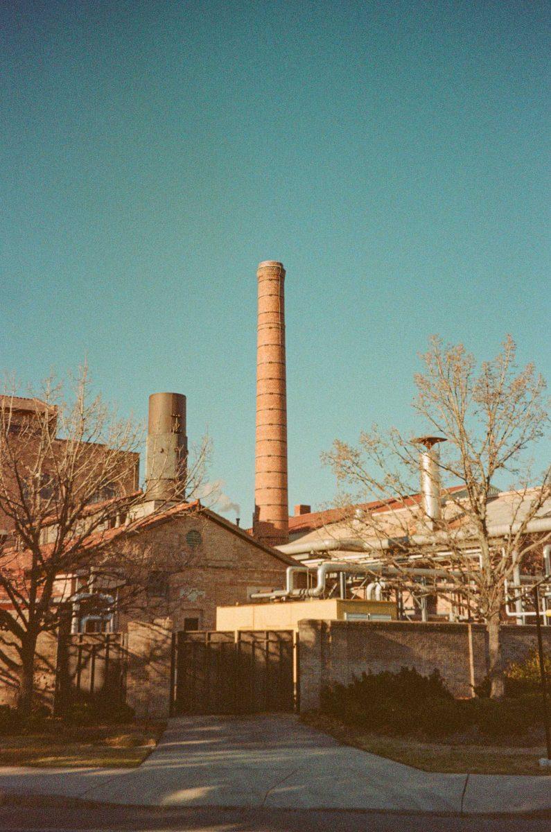 A smoke stack rises above the surrounding buildings on Feb. 20, 2021, at the Cain Department of Chemical Engineering.