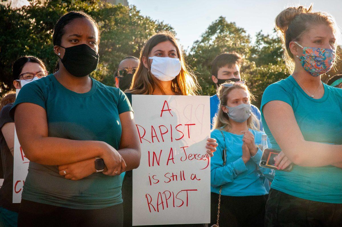 LSU students stand in support of sexual assault survivors on Friday, Nov. 20 at Pete Maravich Assembly Center on N Stadium Dr.