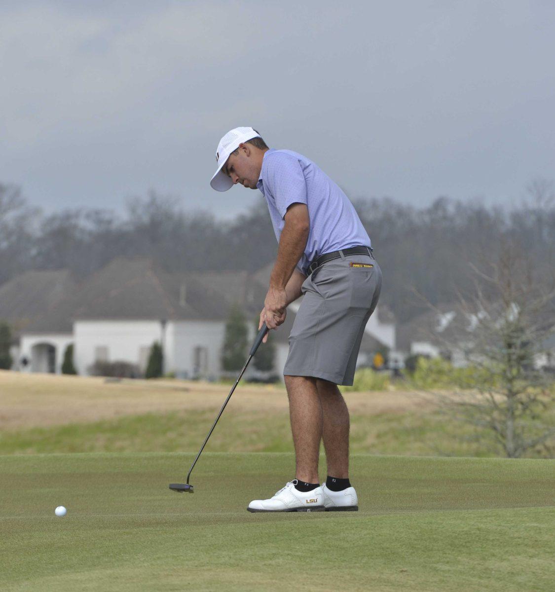 LSU men's golf sophomore Connor Gaunt putts the ball at the LSU Invitational Friday, Feb. 26, 2021 at University Club on Memorial Tower Drive in Baton Rouge, La.