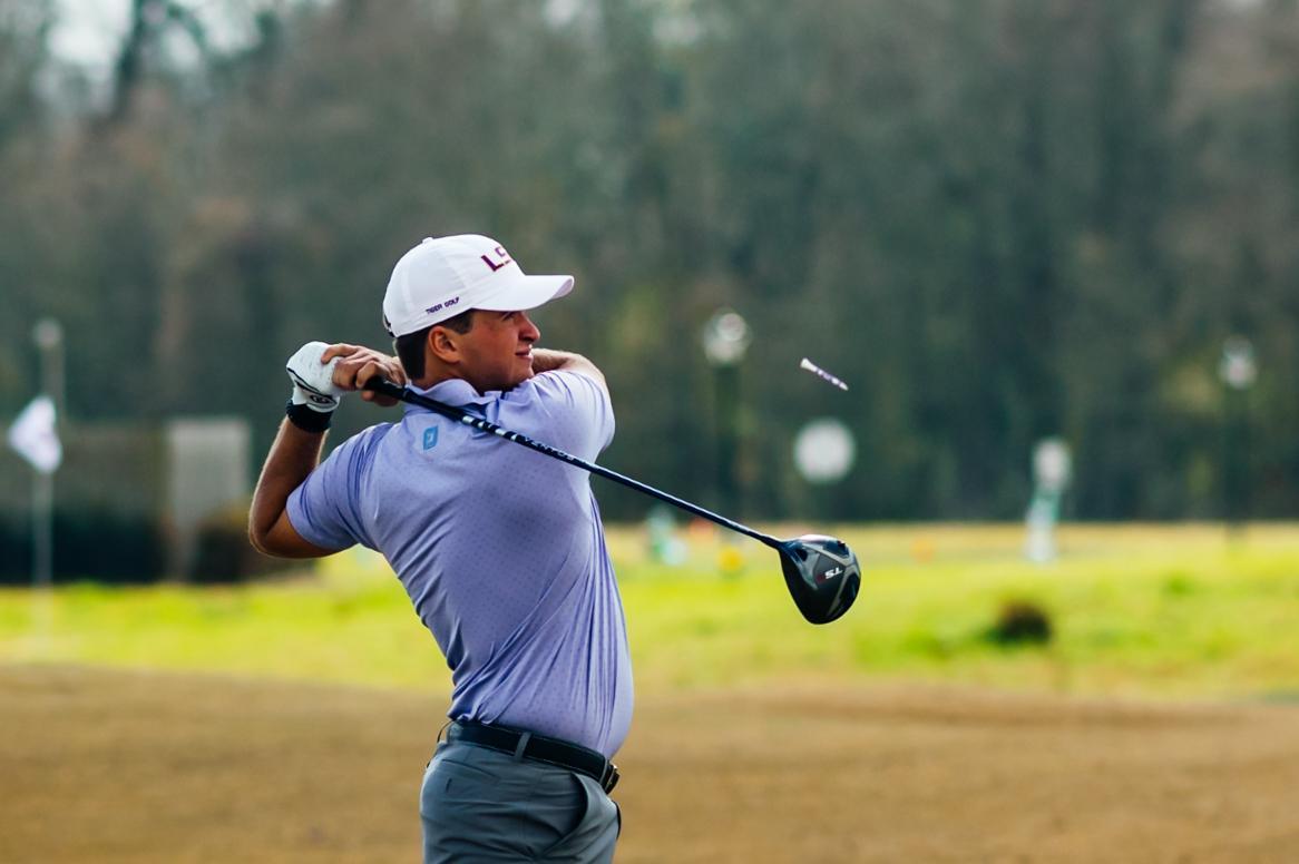 <p>LSU men's golf junior Garrett Barber swings Friday, Feb. 26, 2021 during the LSU Invitational hosted at the University Club on Memorial Tower Drive in Baton Rouge, La.</p>