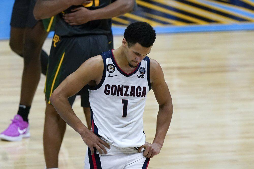 Gonzaga guard Jalen Suggs (1) walks on the court at the end of the championship game against Baylor in the men's Final Four NCAA college basketball tournament, Monday, April 5, 2021, at Lucas Oil Stadium in Indianapolis. (AP Photo/Michael Conroy)