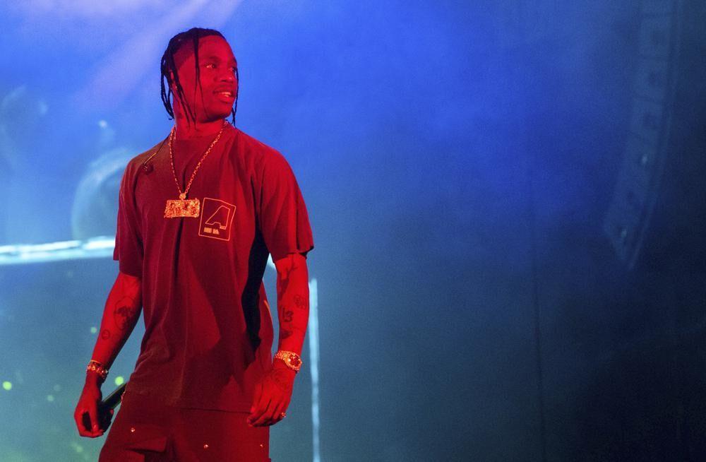 FILE - In this Sept. 15, 2019 file photo, Travis Scott performs during Day 2 of Music Midtown in Atlanta. In April 2021, Scott was honored for his work as one of five recipients of the inaugural RAD impact awards. Scott plans to give &#8220;several&#8221; scholarships to HBCU students with the funds. (Photo by Paul R. Giunta/Invision/AP, File)