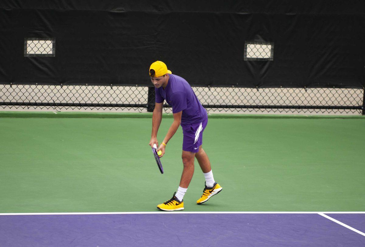 LSU men&#8217;s tennis redshirt freshman Ronald Hohmann prepares the serve the ball Sunday, Feb. 28, 2021 during LSU&#8217;s 1-4 loss against South Carolina in the LSU Tennis Complex on Gourrier Avenue in Baton Rouge.