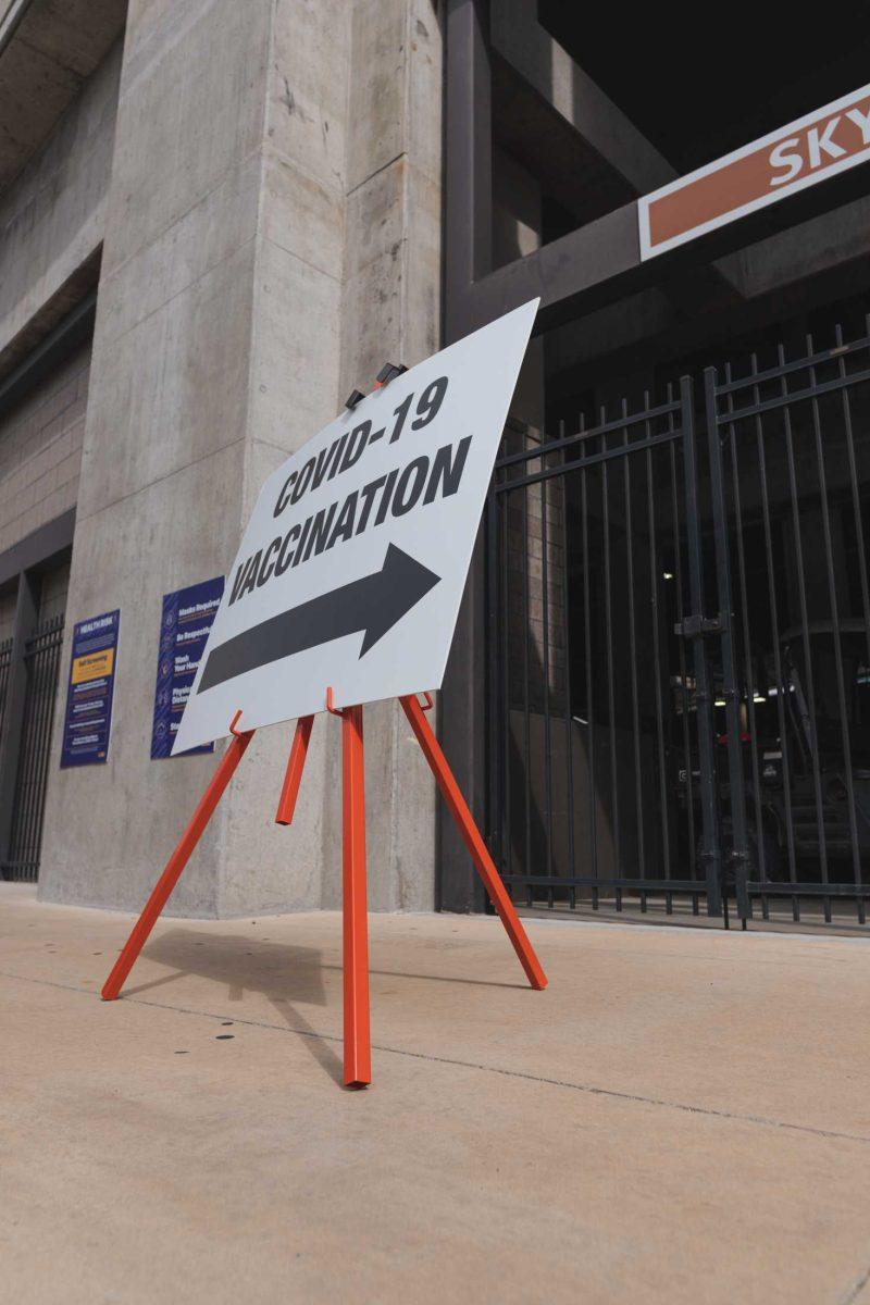 A sign directs people toward the vaccination site on Mar. 14, 2021 at Tiger Stadium.