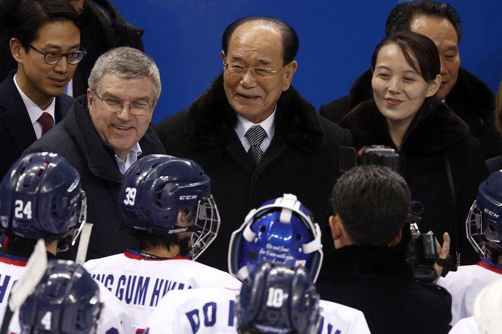 FILE - In this Feb. 10, 2018, file photo, IOC president Thomas Bach, second from left, and Kim Yo Jong, right, sister of North Korean leader Kim Jong Un, talks with players after the preliminary round of the women's hockey game between Switzerland and the combined Koreas at the 2018 Winter Olympics in Gangneung, South Korea. North Korea has decided not to participate in this year&#8217;s Olympic Games in Tokyo as it continues a self-imposed lockdown amid the coronavirus pandemic. A website run by the North's Sports Ministry said the decision was made during a national Olympic Committee meeting on March 25, 2021 where members prioritized protecting athletes from the &#8220;world public health crisis caused by COVID-19.&#8221; (AP Photo/Jae C. Hong, File)&#160;&#160;&#160;&#160;&#160;