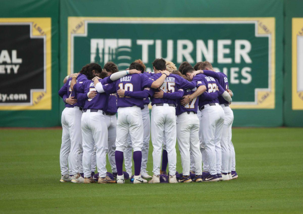 LSU baseball players huddle together pre-game Saturday, April 17, 2021 during LSU&#8217;s 2-4 loss against South Carolina in Alex Box Stadium on Gourrier Avenue in Baton Rouge.