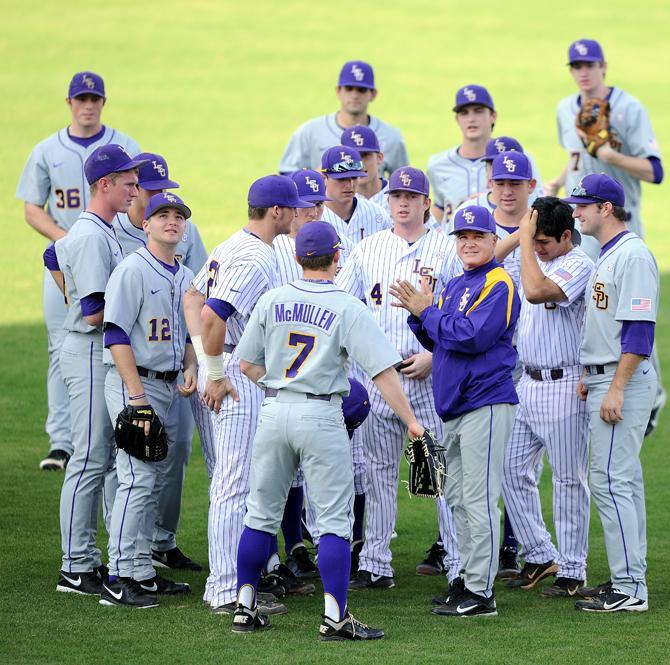 The 2013 LSU baseball team gathers around Tuesday, Feb. 5, 2013 around head coach Paul Mainieri.