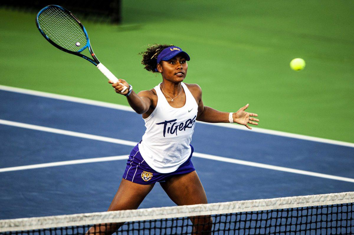 LSU women&#8217;s tennis senior Paris Corley attempts to hit the ball Friday, March 12, 2021 during LSU&#8217;s 4-0 loss against Georgia in the LSU Tennis Complex on Gourrier Avenue in Baton Rouge.