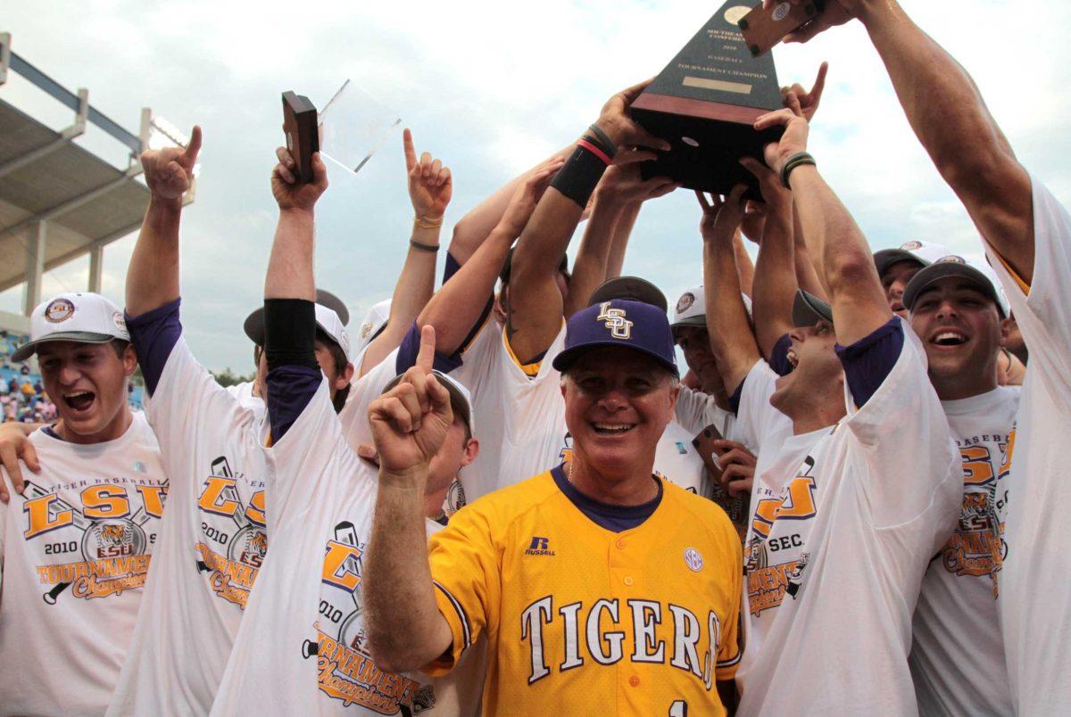 LSU head coach Paul Mainieri celebrates with the team May 30 after beating Alabama, 4-3, during the Southeastern Conference Tournament.