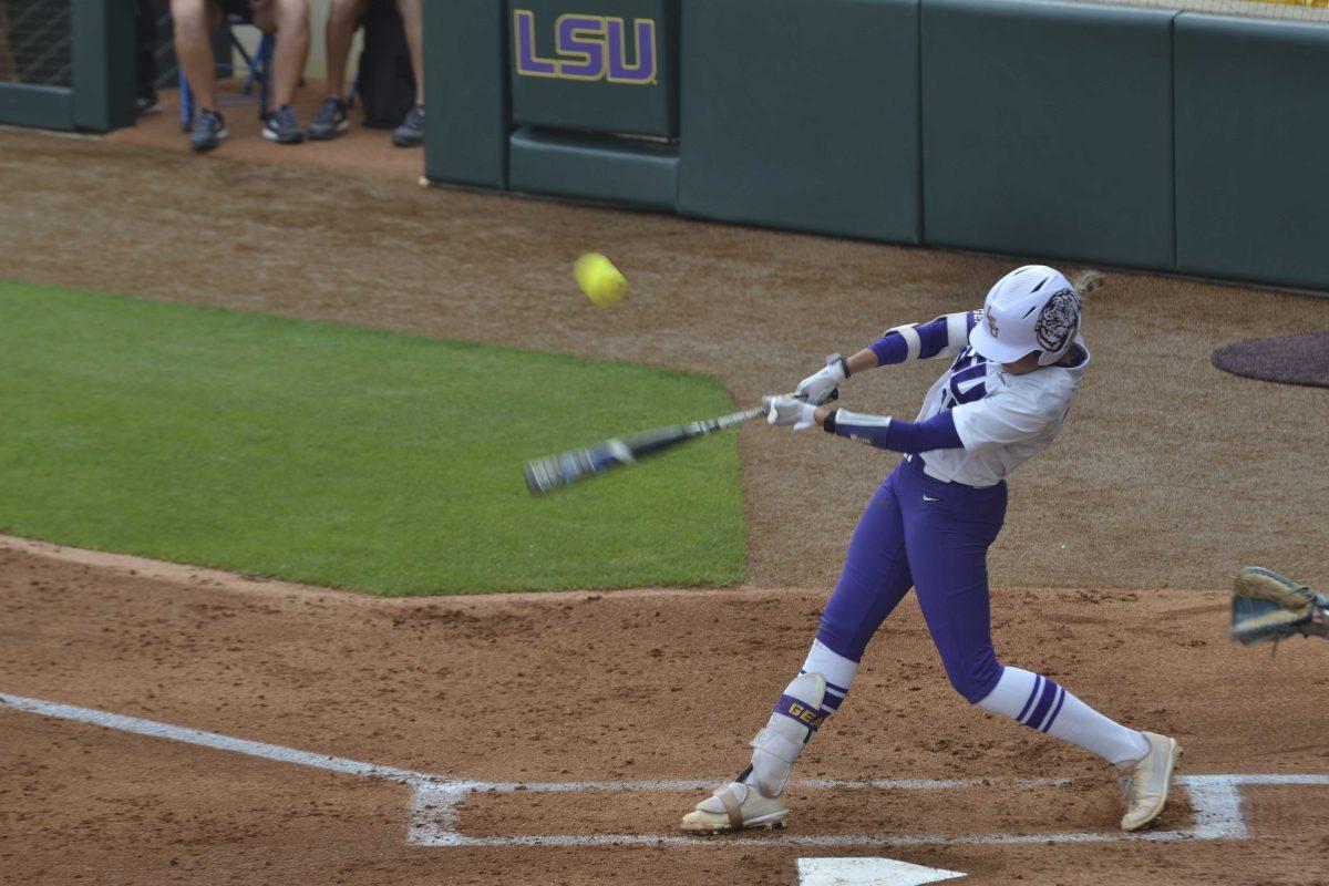 LSU softball sophomore shortstop Taylor Pleasants (17) makes contact with the ball Thursday, May 21, 2021 during LSU&#8217;s 10-2 victory over McNeese State in Tiger Park.