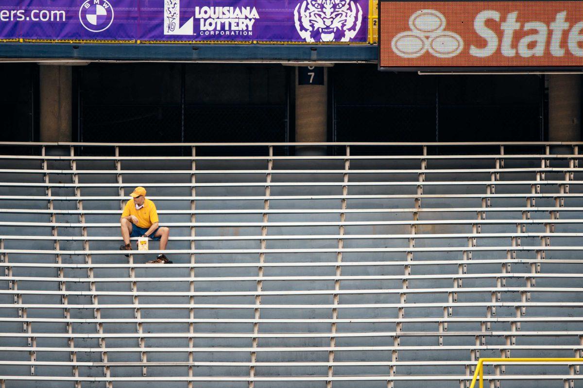 An LSU fan waits for the game to begin Saturday, Sep. 26, 2020 before LSU's 44-24 loss against Mississippi State in Tiger Stadium.