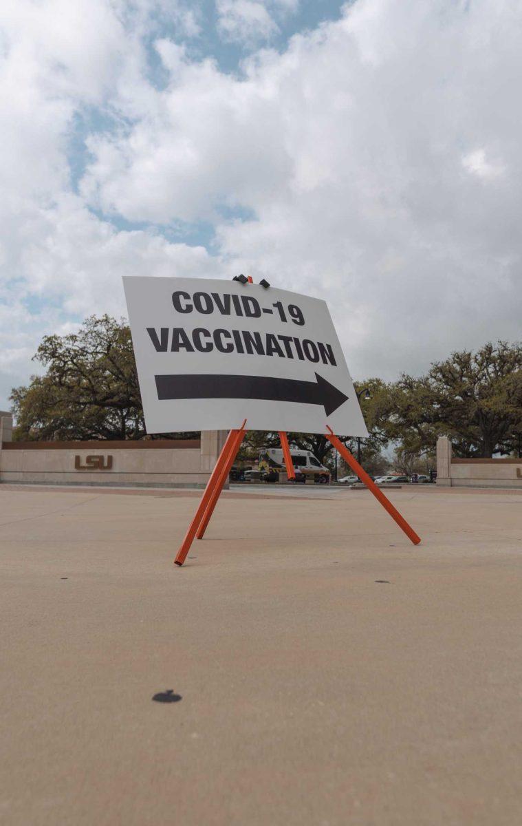 A sign directs people toward the vaccination site on Mar. 14, 2021 at Tiger Stadium.