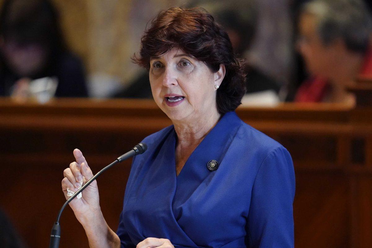 Sen. Beth Mizell, R-Franklinton, speaks in the Senate Chambers during a veto session in Baton Rouge, La., Tuesday, July 20, 2021. Louisiana state senators have narrowly voted to overturn Democratic Gov. John Bel Edwards' rejection of a bill prohibiting transgender students from participating in school sports. The vote came Tuesday on the opening day of the first veto session under the state's nearly 50-year-old constitution. (AP Photo/Gerald Herbert)