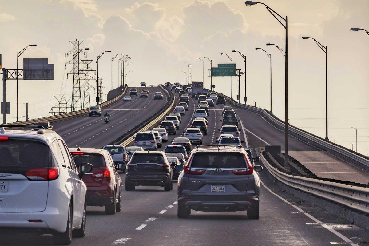 Vehicles head slowly east on the Interstate-10 twin spans leaving New Orleans while only a trickle of cars heads west back into the city before landfall of Hurricane Ida in New Orleans, Saturday, Aug. 28, 2021. A combination of voluntary and mandatory evacuations have been called for cities and communities across the region including New Orleans, where the mayor ordered a mandatory evacuation for areas outside the city&#8217;s levee system and a voluntary evacuation for residents inside the levee system. (AP Photo/Matthew Hinton)