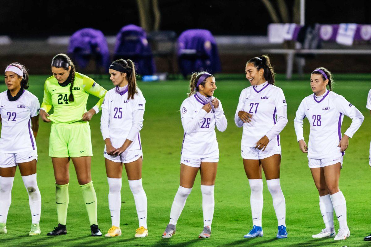 LSU soccer freshman forward Brooke Cutura (26) laughs with redshirt-senior defender Raven Guerrero (27) Friday, Oct. 30, 2020 before LSU's 0-2 loss to Vanderbilt at the LSU Soccer Stadium on W Lakeshore Drive.