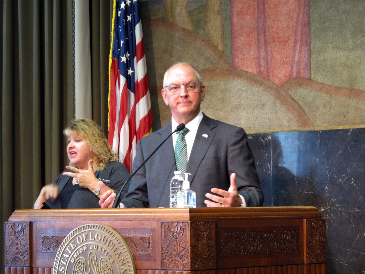 Louisiana Gov. John Bel Edwards speaks about the state's latest surge in coronavirus cases, on Friday, July 23, 2021, in Baton Rouge, La. Edwards recommends that his state's residents return to wearing masks indoors, whether they are vaccinated against COVID-19 or not, if they are unable to distance from people. (AP Photo/Melinda Deslatte)