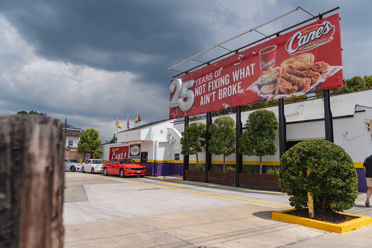 A billboard reads &#8220;25 Years of Not Fixing What Ain&#8217;t Broke&#8221; on Aug. 25, 2021, above the Raising Cane&#8217;s restaurant at 3313 Highland Road in Baton Rouge.