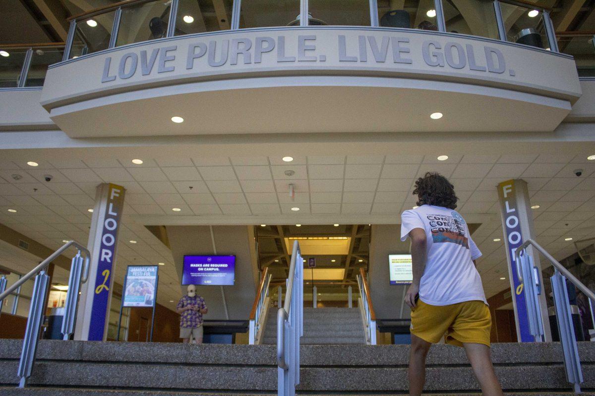 A LSU student walks up steps Thursday, Sept. 23, 2021, in the Student Union on LSU's campus.