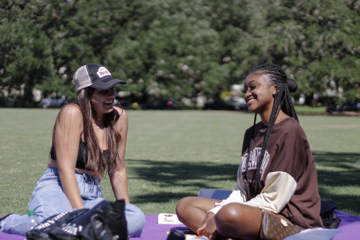 LSU sophomores Elie Robbins and Chloe Brown enjoy the day on Friday, Sept. 24, 2021, at the LSU Parade Ground in Baton Rouge, La.