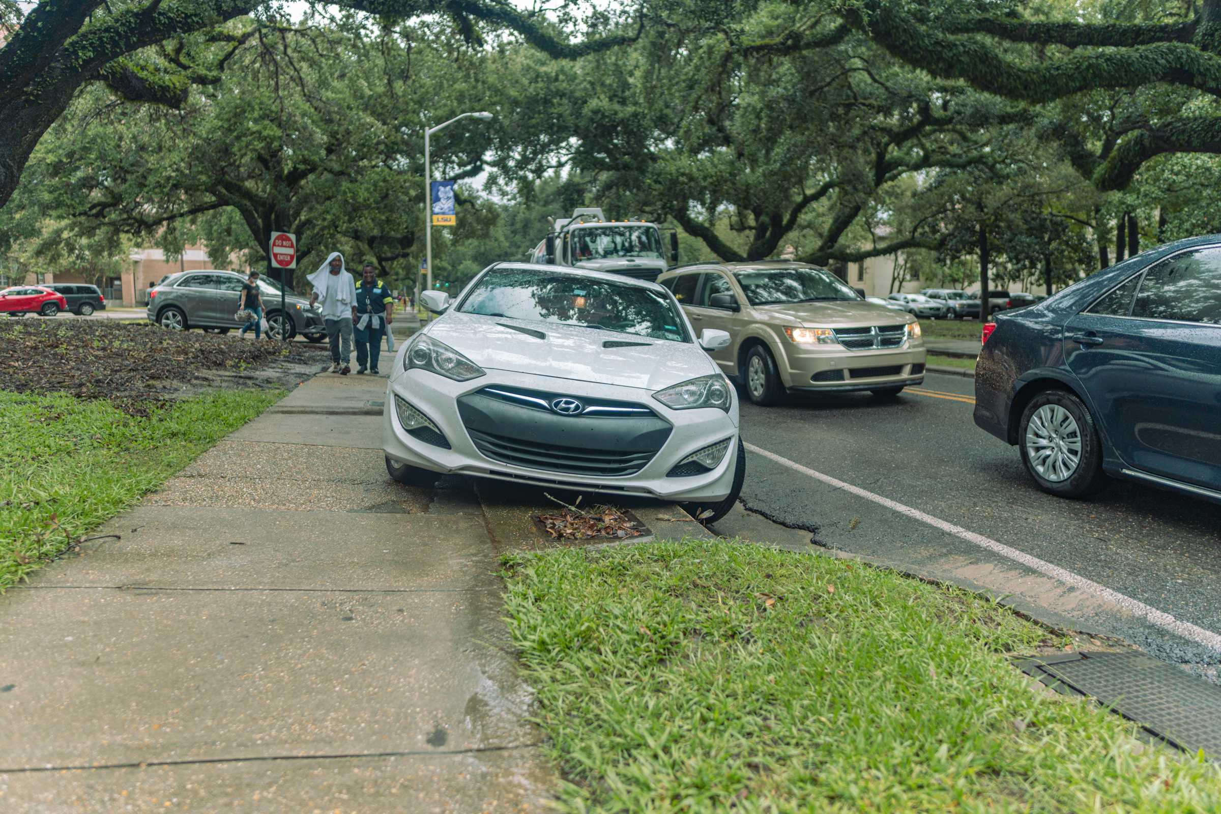 PHOTOS: Flooding from Tropical Depression Nicholas causes distress for students parked on campus