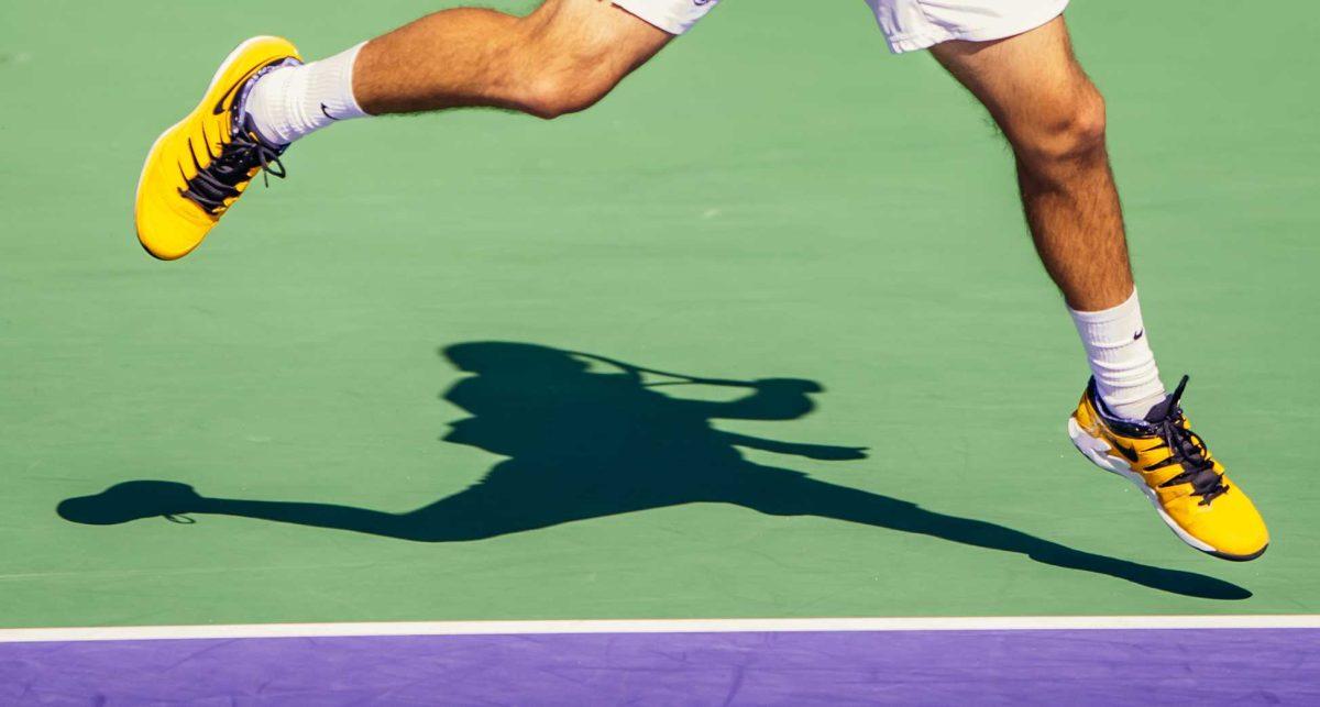 LSU men's tennis redshirt-freshman Ronald Hohmann jumps to hit the ball Sunday, Jan. 31, 2021 during LSU's 4-1 win over Rice at the LSU Tennis Complex on Gourrier Avenue in Baton Rouge, La.