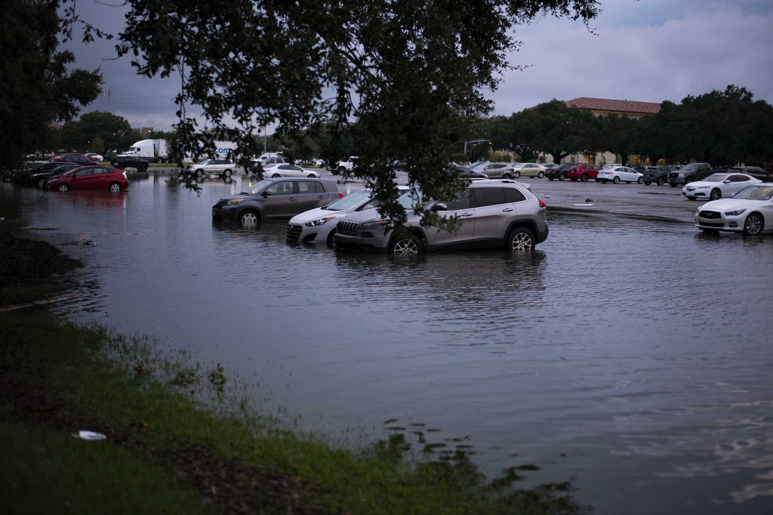 PHOTOS: Flooding from Tropical Depression Nicholas causes distress for students parked on campus