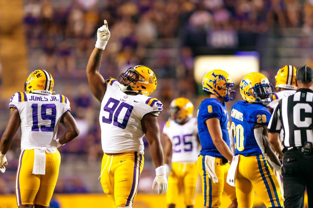 LSU football freshman defensive tackle Jacobian Guillory points to the sky Saturday, Sept. 11, 2021, after a play during LSU's 34-7 win against McNeese at Tiger Stadium in Baton Rouge, La.