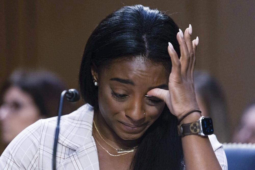 United States Olympic gymnast Simone Biles testifies during a Senate Judiciary hearing about the Inspector General's report on the FBI's handling of the Larry Nassar investigation on Capitol Hill, Wednesday, Sept. 15, 2021, in Washington. Nassar was charged in 2016 with federal child pornography offenses and sexual abuse charges in Michigan. He is now serving decades in prison after hundreds of girls and women said he sexually abused them under the guise of medical treatment when he worked for Michigan State and Indiana-based USA Gymnastics, which trains Olympians.