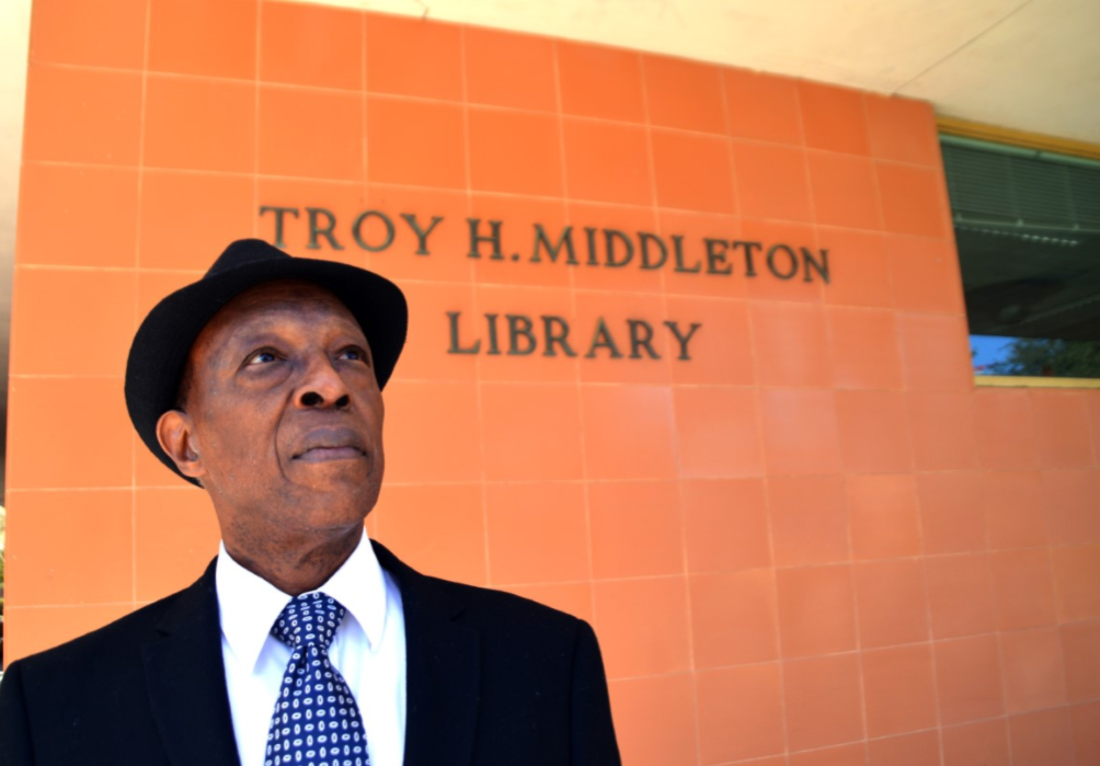 Thomas Durant stands in front of the former Troy H. Middleton Library. Middleton's name was recently removed from the library after his segregationist beliefs came to light.