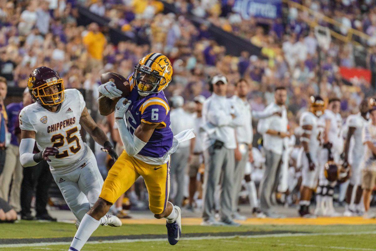 LSU football freshman wide receiver Deion Smith (6) tries to maintain control of the ball on Saturday, Sept. 18, 2021, during LSU&#8217;s 49-21 victory over Central Michigan inside Tiger Stadium in Baton Rouge, La.