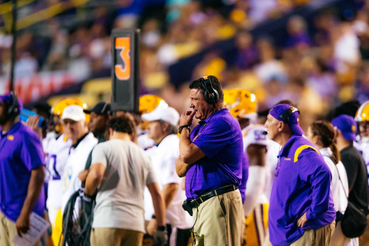 LSU football head coach Ed Orgeron bites his nails Saturday, Sept. 11, 2021, during LSU's 34-7 win against McNeese at Tiger Stadium in Baton Rouge, La.