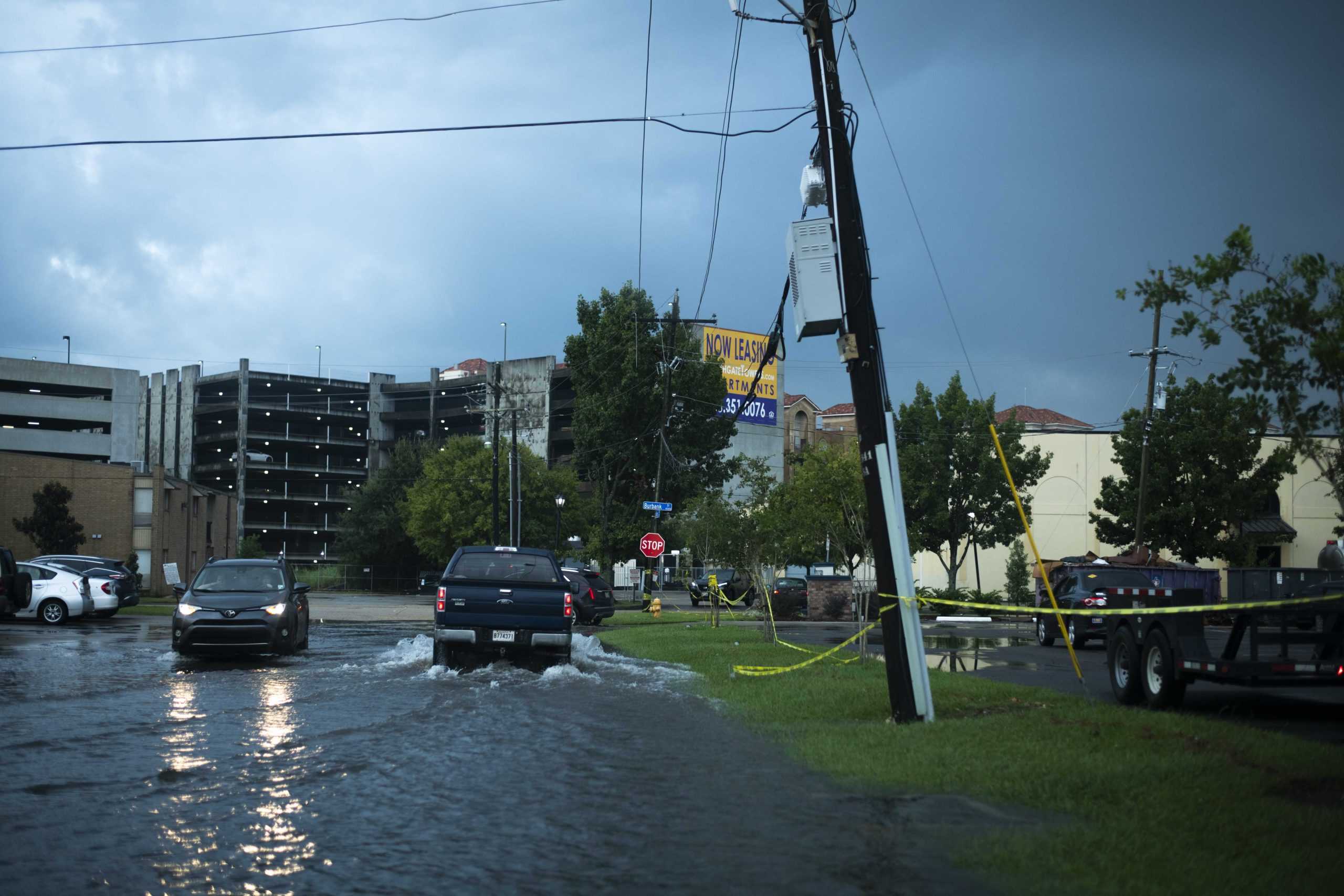 PHOTOS: Flooding from Tropical Depression Nicholas causes distress for students parked on campus