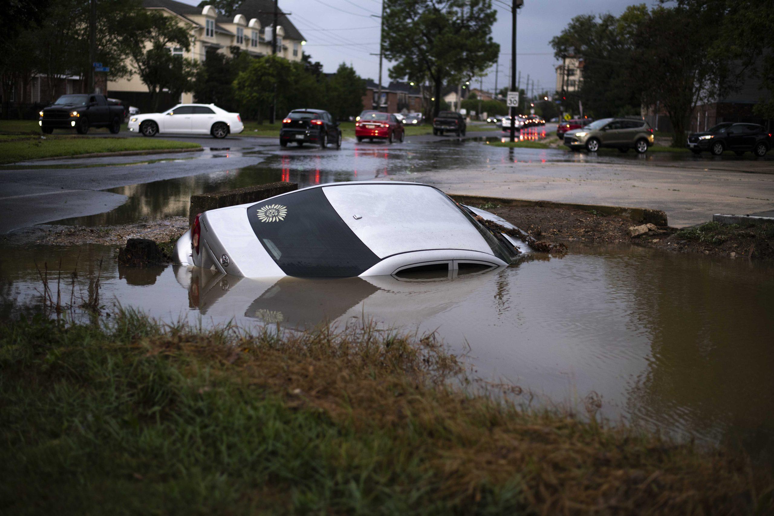 PHOTOS: Flooding from Tropical Depression Nicholas causes distress for students parked on campus