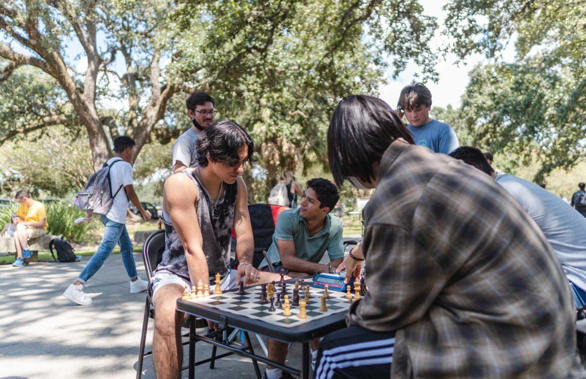 LSU students (in clockwise order starting from left chessboard) Abe, a junior electrical engineering major, Javier Calderon, a sophomore political science major, Daniel N&#250;&#241;ez, a sophomore philosophy major, and Landon, a freshman biochemistry major, play chess on Tuesday, Sept. 21, 2021, outside of the Student Union.