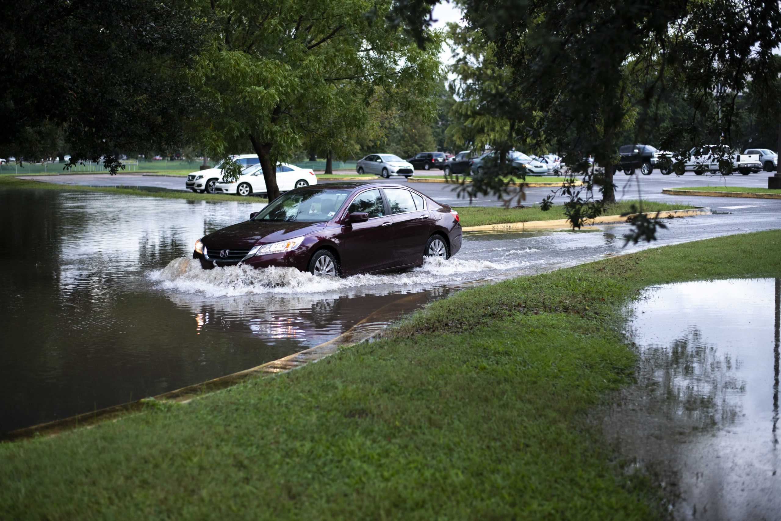 PHOTOS: Flooding from Tropical Depression Nicholas causes distress for students parked on campus