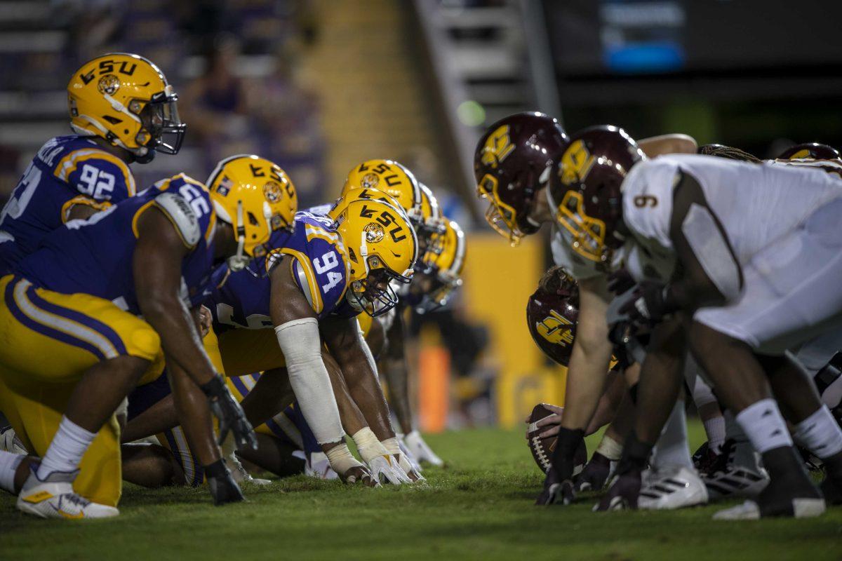 LSU football defensive players perpare for a Central Michigan play Saturday, Sept. 18, 2021, during the LSU vs Central Michigan game in Tiger Stadium.