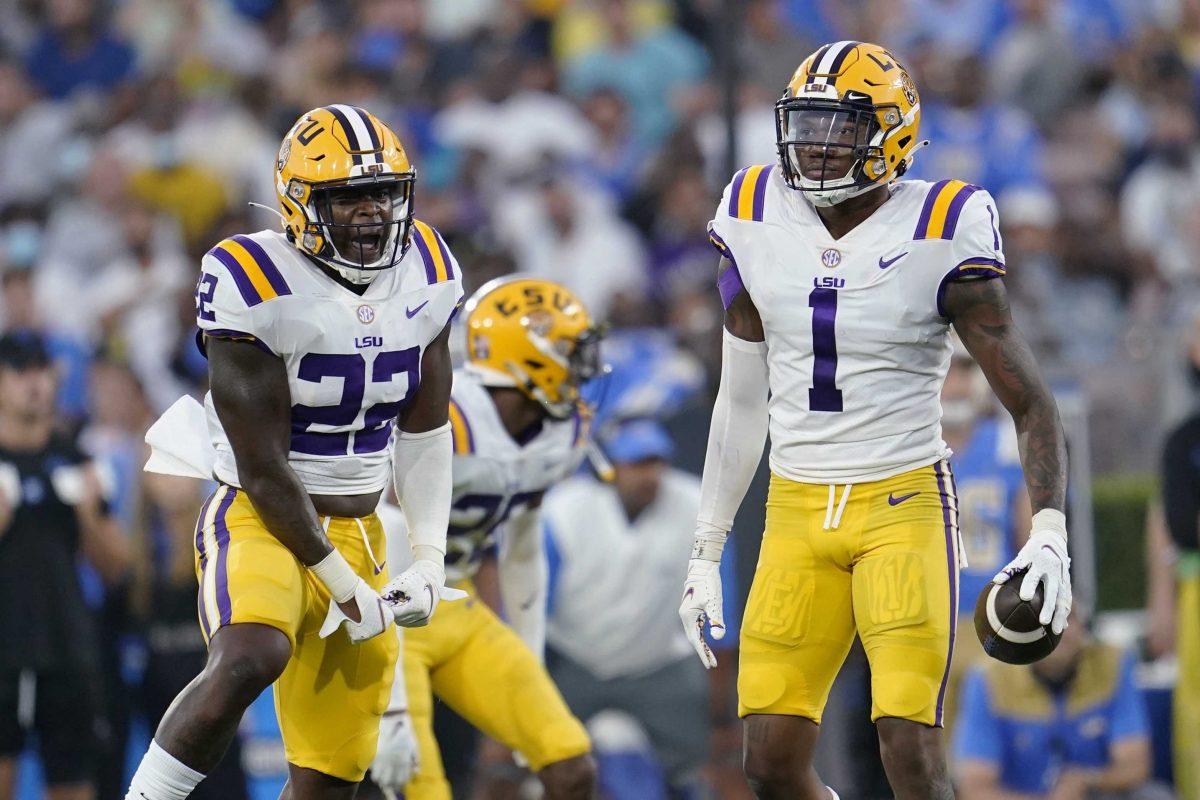 LSU cornerback Eli Ricks (1) holds the ball after intercepting a UCLA pass during the first half of an NCAA college football game Saturday, Sept. 4, 2021, in Pasadena, Calif. (AP Photo/Marcio Jose Sanchez)