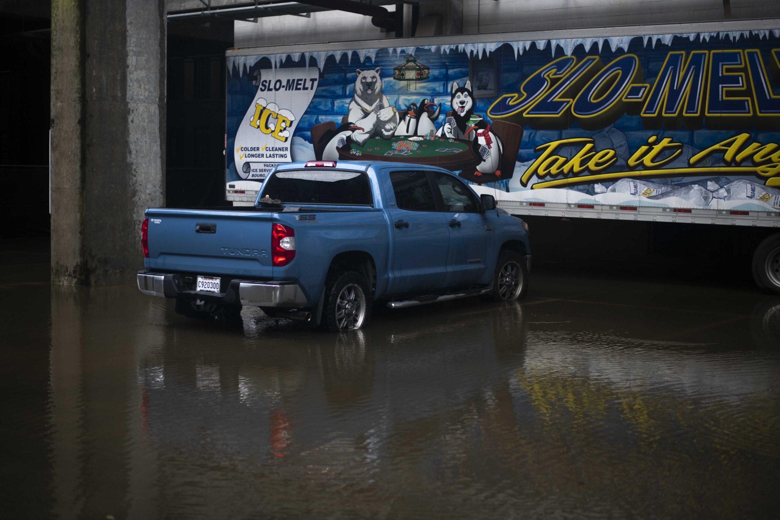 PHOTOS: Flooding from Tropical Depression Nicholas causes distress for students parked on campus