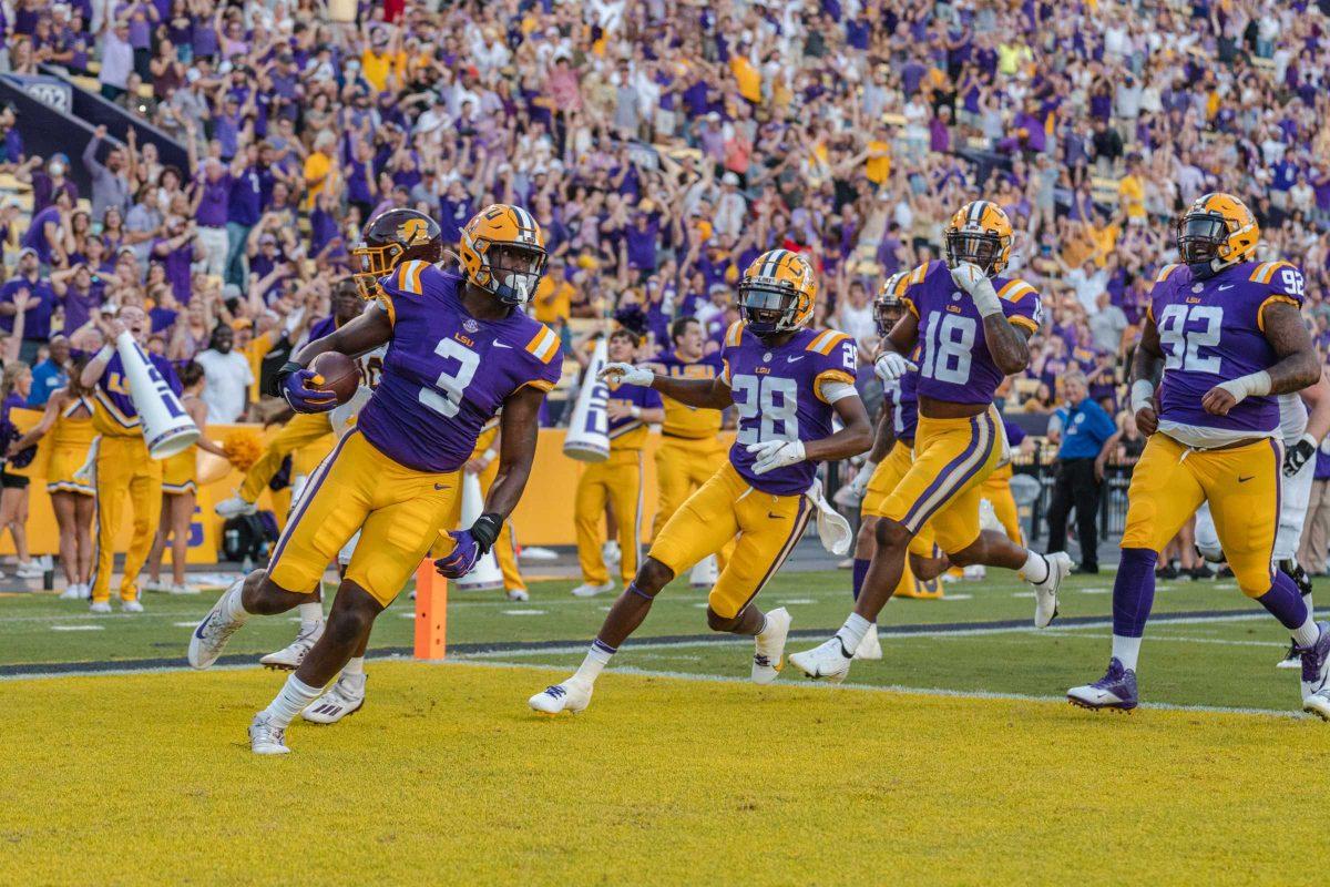 LSU football graduate student defensive end Andre Anthony (3) scores a touchdown on Saturday, Sept. 18, 2021, during LSU&#8217;s 49-21 victory over Central Michigan inside Tiger Stadium in Baton Rouge, La.