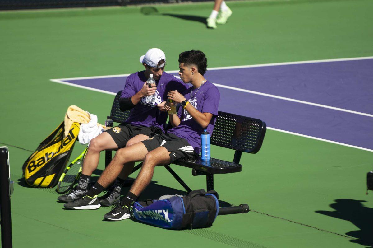 LSU men&#8217;s tennis freshman Joao Graca and LSU men&#8217;s tennis redshirt junior Joey Thomas talk strategy Sunday, Feb. 7, 2021 during LSU&#8217;s 2-5 loss against Tulane in the LSU Tennis Complex on Gourrier Avenue in Baton Rouge.