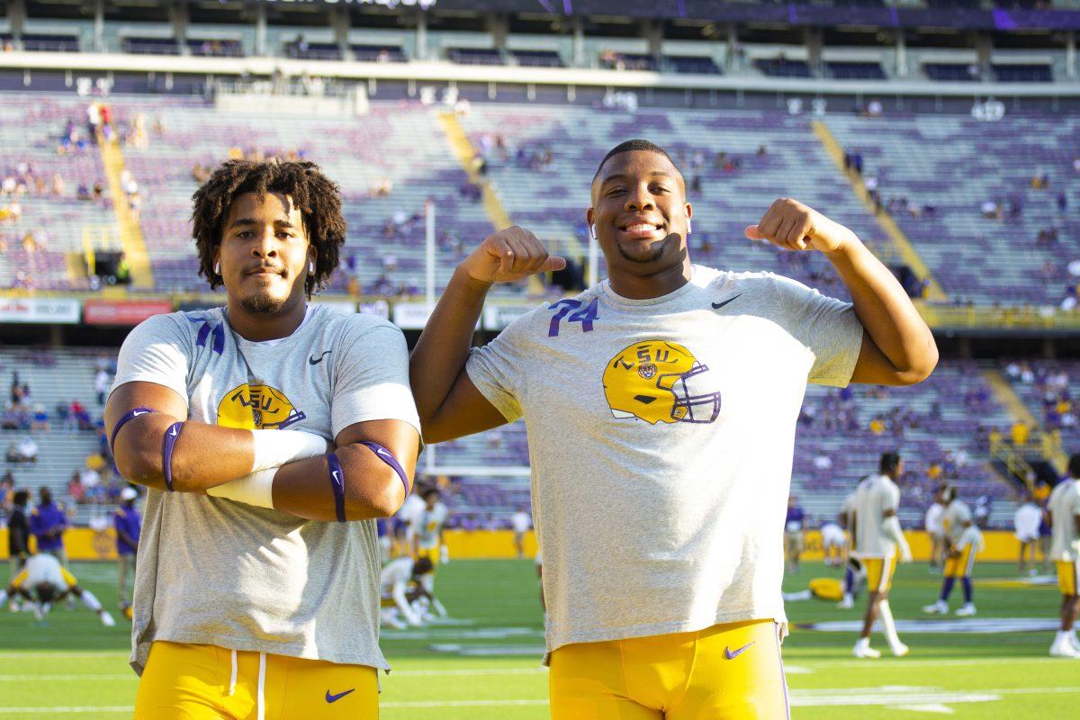 LSU football freshman offensive line Xaiver Hill (71) and freshman offensive line Marucs Dumervil (74) pose Saturday, Sept. 11, 2021, before LSU&#8217;s 34-7 win against McNeese State University at Tiger Stadium in Baton Rouge, La.