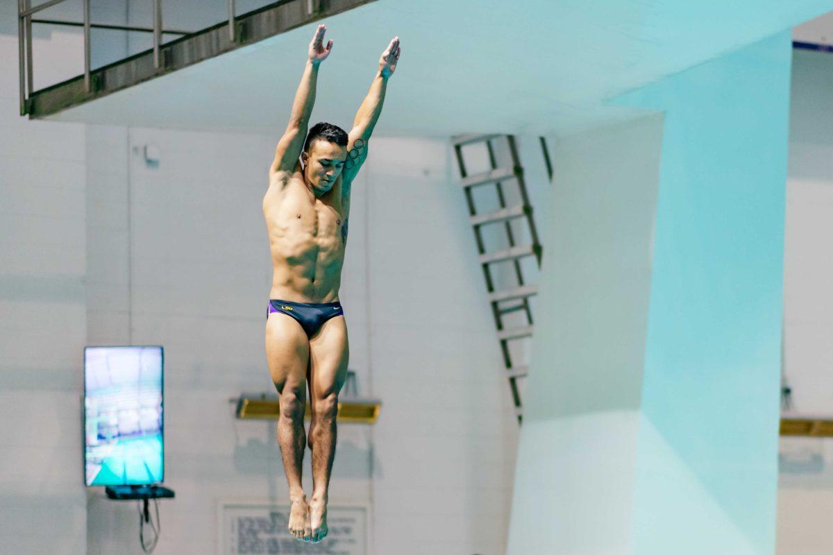 LSU 5th-year senior and 2020 Olympian Juan Celaya-Hernandez dives Saturday, Oct. 9, 2021, in the men one meter diving event during LSU men's 194-106 win over GCU at the LSU Natatorium in Baton Rouge, La.