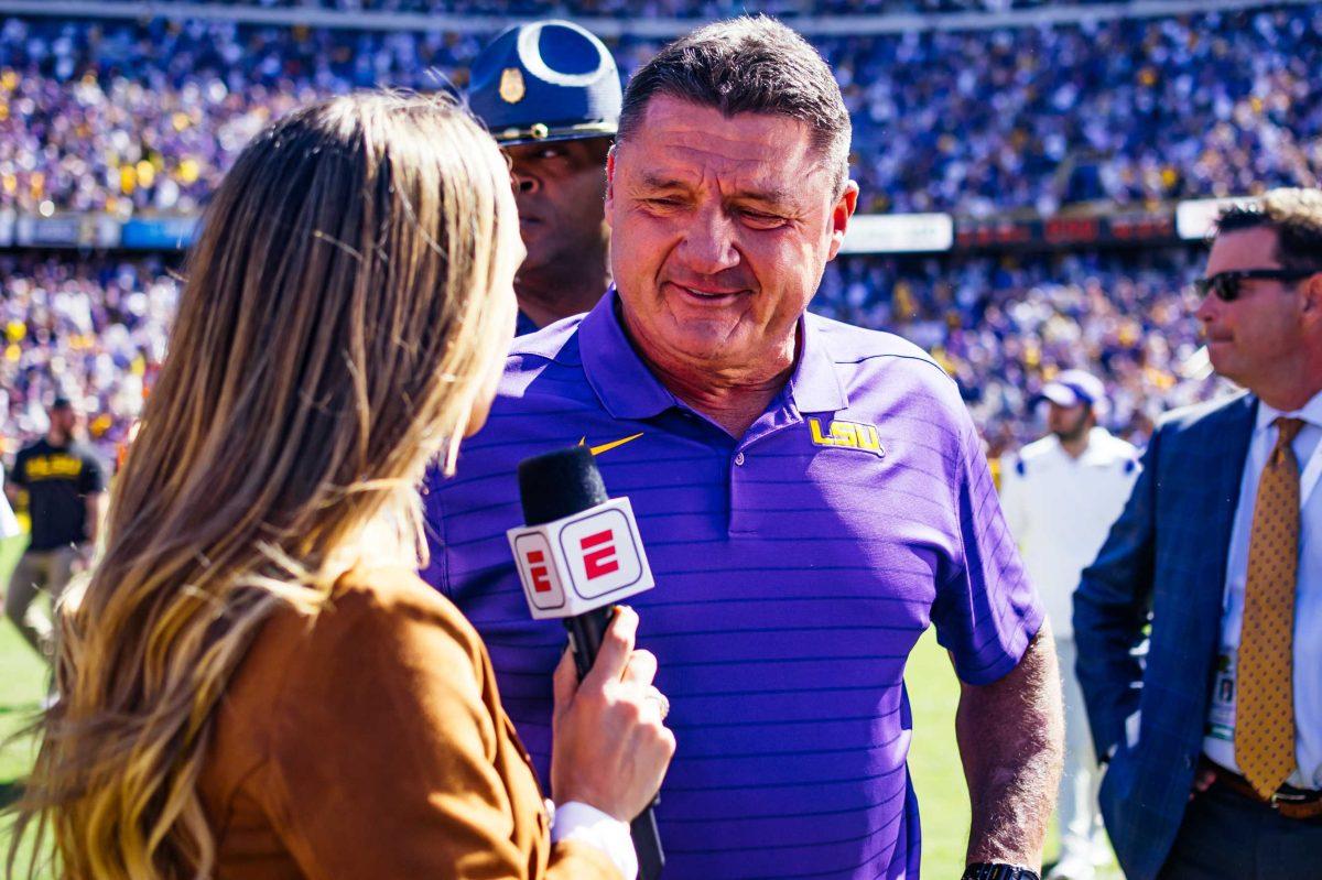 LSU football head coach Ed Orgeron interviews with an ESPN host Saturday, Oct. 16, 2021, after LSU's 49-42 win against Florida at Tiger Stadium in Baton Rouge, La.