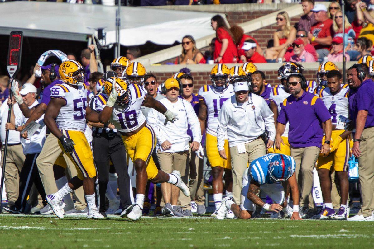 LSU football senior linebacker Damone Clark (18) celebrates after sacking the opposing quarterback on Saturday, Oct. 23, 2021, during LSU's 31-17 loss against the University of Mississippi, in Vaught-Hemingway Stadium, Oxford, Mississippi.