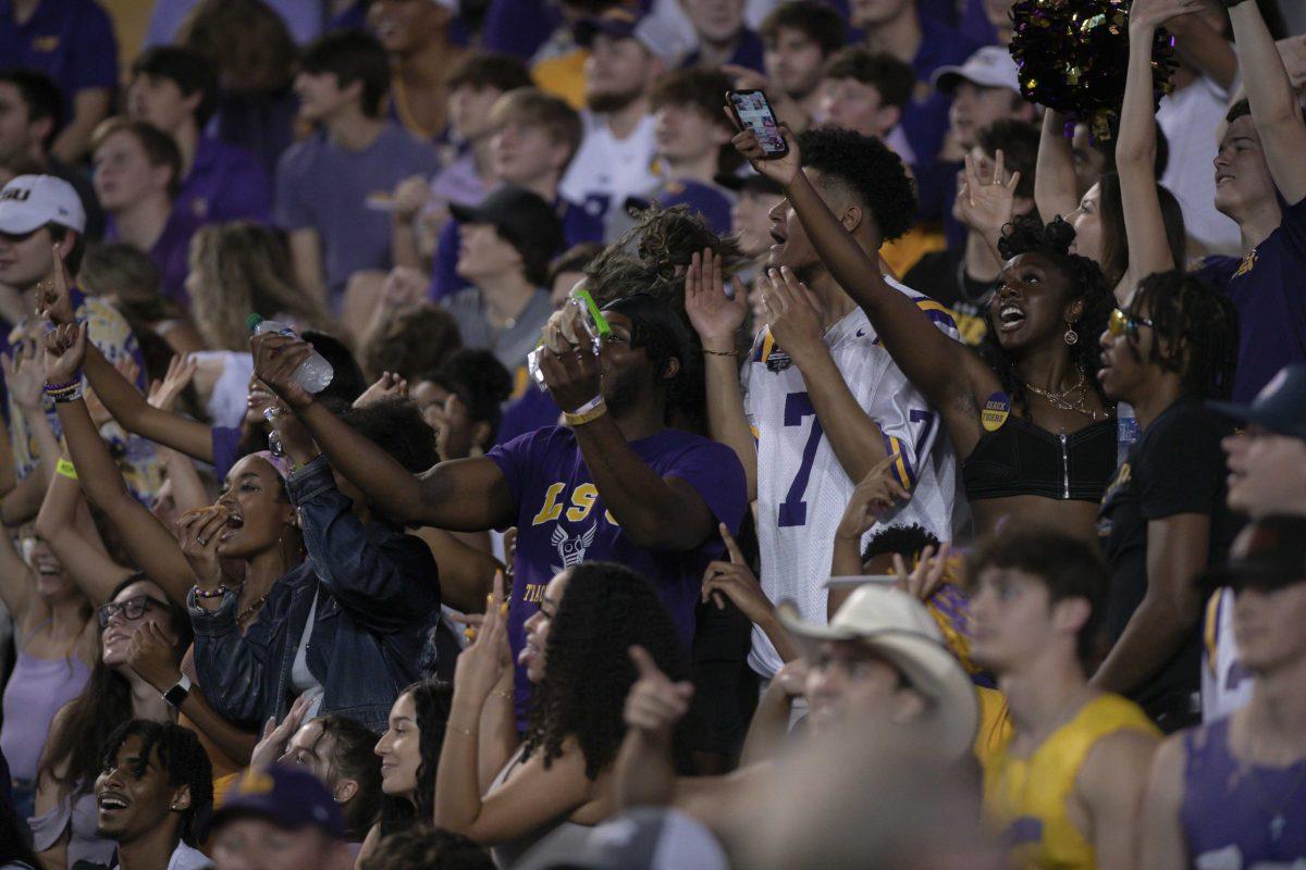 LSU fans cheer for the players on Saturday, Oct. 2, 2021, during LSU's 24-19 loss against Auburn at Tiger Stadium in Baton Rouge, La.