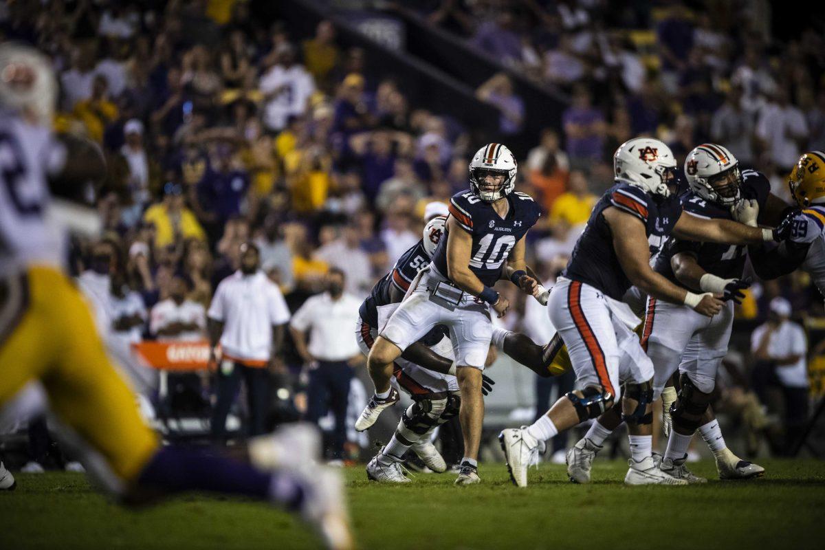 Auburn football junior quarterback Bo Nix (10) throws the ball on Saturday, Oct. 2, 2021, during LSU's 24-19 loss against Auburn at Tiger Stadium in Baton Rouge, La.