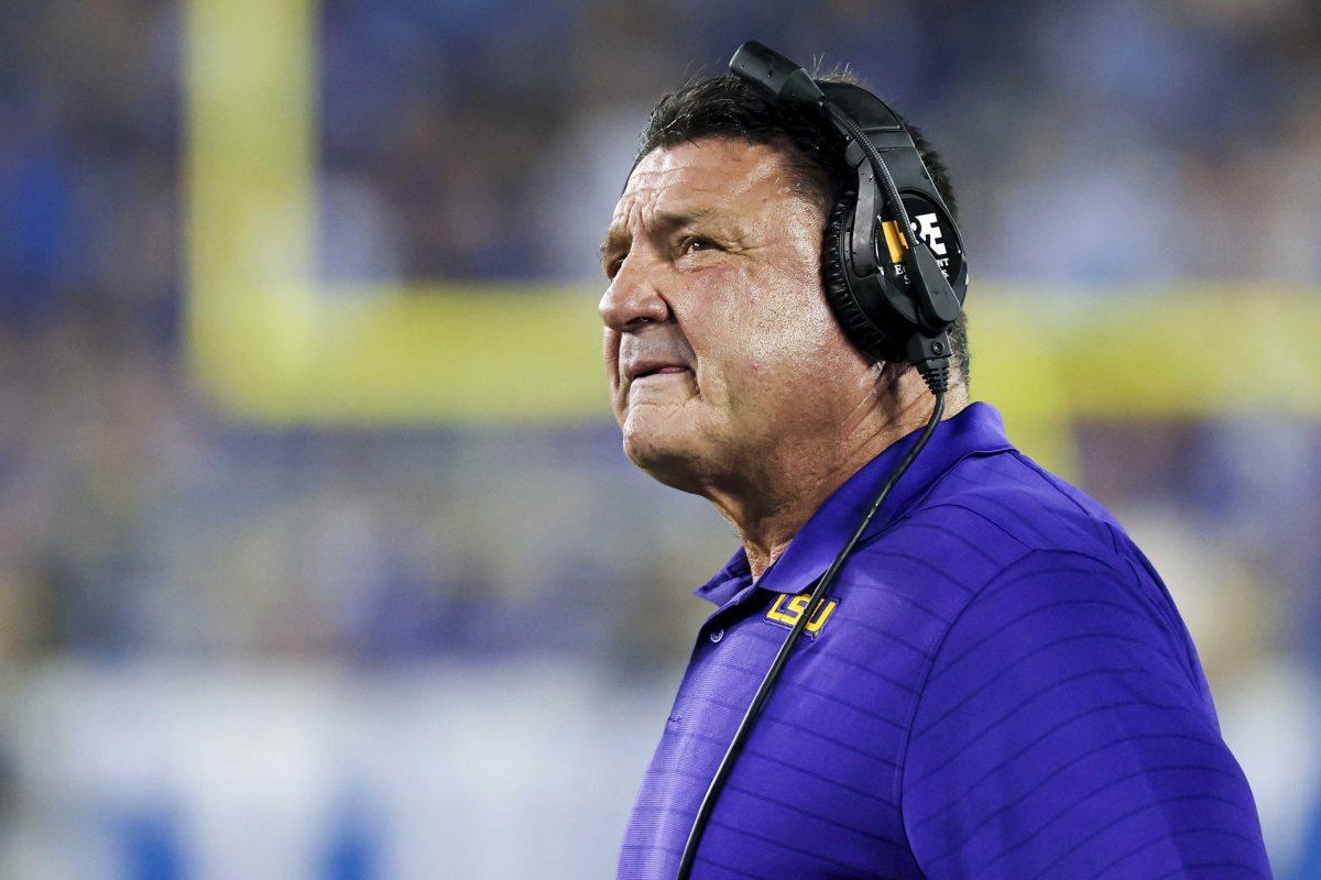 <p>LSU coach Ed Orgeron looks up at the video board during the first half of the tealm's NCAA college football game against Kentucky in Lexington, Ky., Saturday, Oct. 9, 2021. (AP Photo/Michael Clubb)</p>