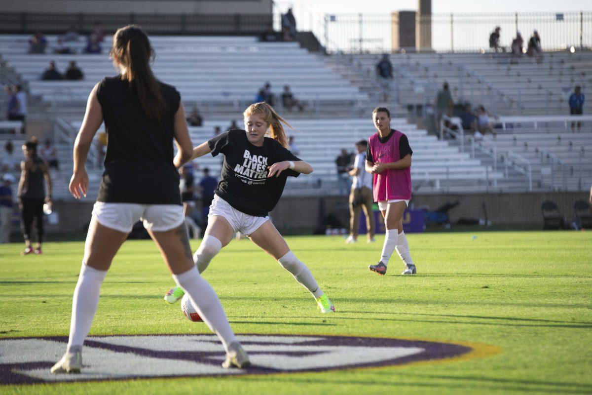 LSU soccer junior defender Anna Rockett (14) performs drills Thursday, Oct. 21, 2021 before LSU&#8217;s 4-0 win against South Carolina at the LSU Soccer Stadium in Baton Rouge, La.